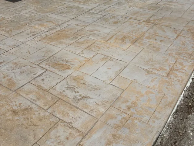 Stamped Concrete or Pavers? What Actually Holds Up on a Florida Patio